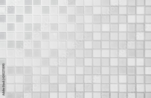 White or gray ceramic wall and floor tiles abstract background.