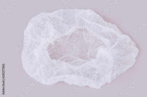 White medical disposable cap isolated on white