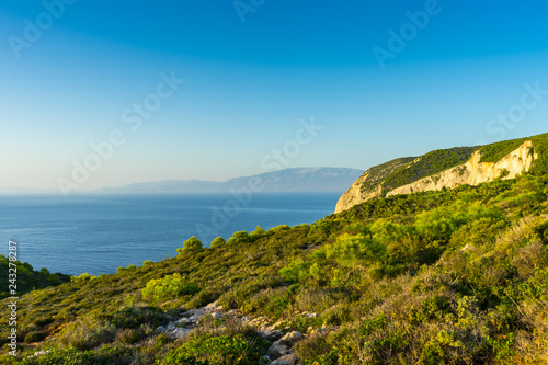 Greece, Zakynthos, Warm sunset light shining on marvellous greek coastal landscape