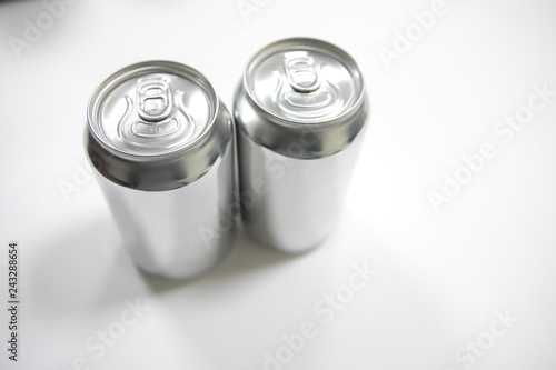 Cans of sweet drinks (or beer) soda cans