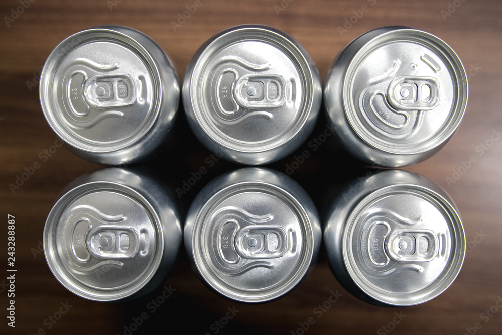 Cans of sweet drinks (or beer) soda cans Cans of sweet drinks (or beer) soda cans