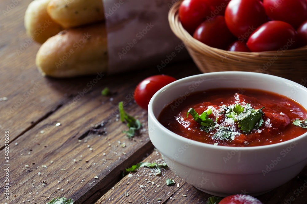Fresh Marinara Pizza sauce in a bowl on wooden background Fresh Marinara Pizza sauce in a bowl on wooden background