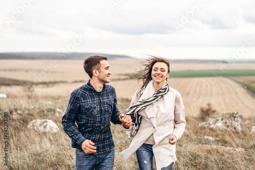 Romantic young couple enjoy spending time together outdoor.