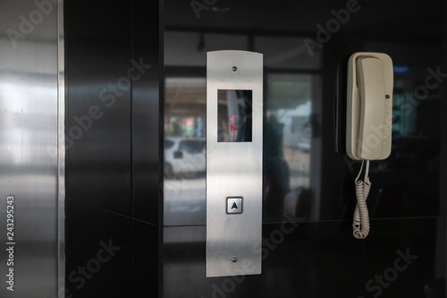 Up Arrow metal button's elevator.first floor display on panel.Elevator Conveying Transportation Concept of Elevator Arrows in Lobby Area.
