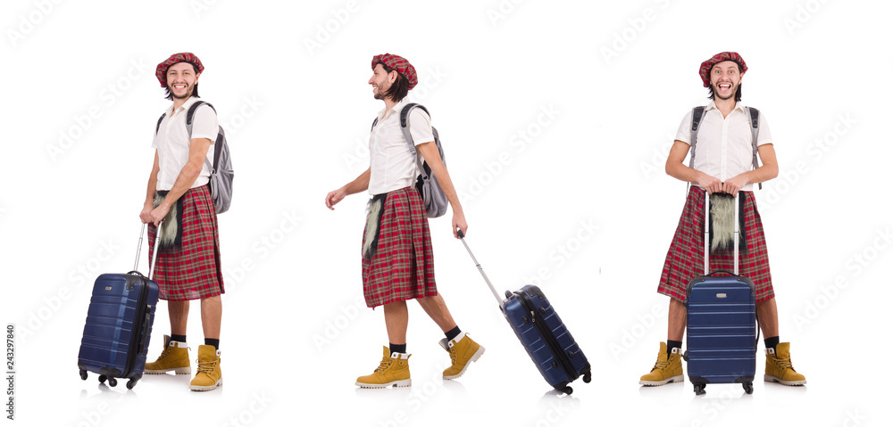 Man in scottish skirt with suitcase isolated on white