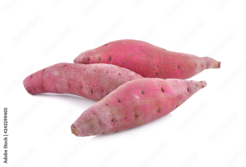 whole fresh Japanese sweet potatoes on white background whole fresh Japanese sweet potatoes on white background