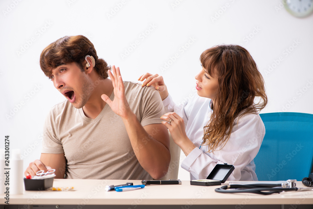 Patient with hearing problem visiting doctor otorhinolaryngologi Patient with hearing problem visiting doctor otorhinolaryngologi