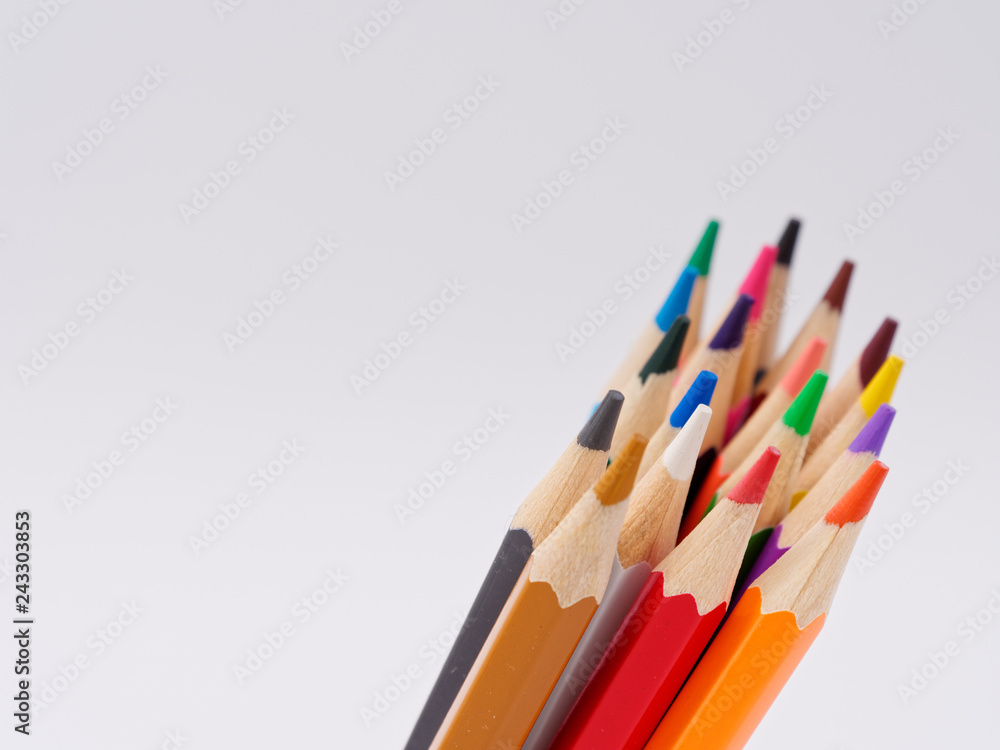 Fototapeta premium colored pencils sharpened on a white background.