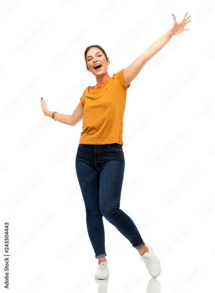emotions and people concept - happy young woman or teenage girl in blank orange t-shirt having fun over white background emotions and people concept - happy young woman or teenage girl in blank orange t-shirt having fun over white background