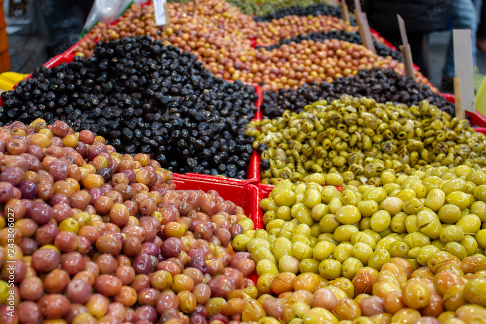Green and black olives on market