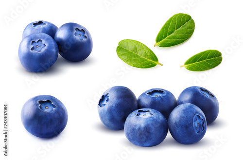 Blueberries set with leaves isolated on white background.