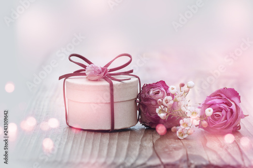 Decoration with roses and smal gift