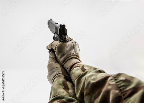 first person shooter shooting pistol