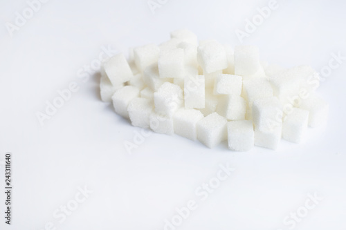 Sugar cubes on  over white