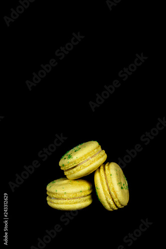 Macarons cookies on a dark background