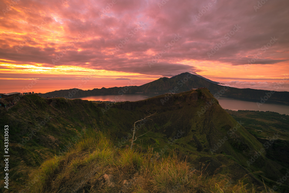 Beautiful view on Agung volcano and lake from the peak of Batur volcano at sunrise, Bali, Indonesia