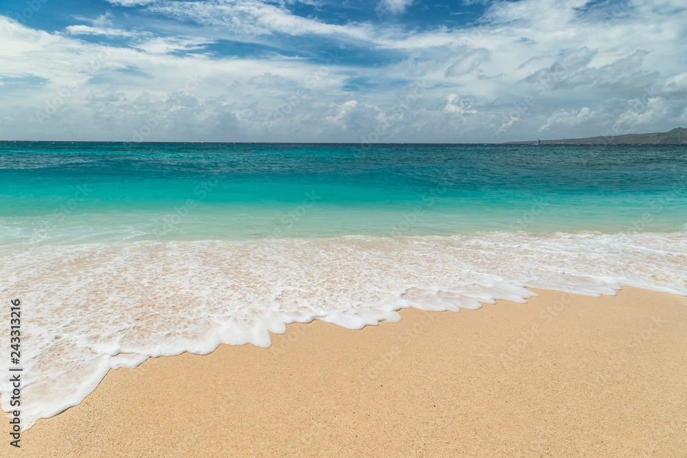 Beautiful Puka beach and blue sky at Boracay Island, Philippines.