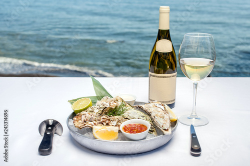 Oysters and wine overlooking the sea