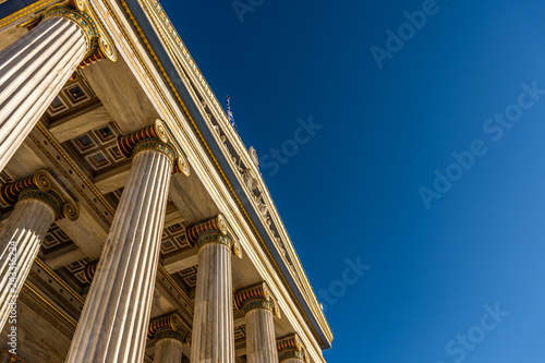 Classical marble pillars detail on the facade of a building