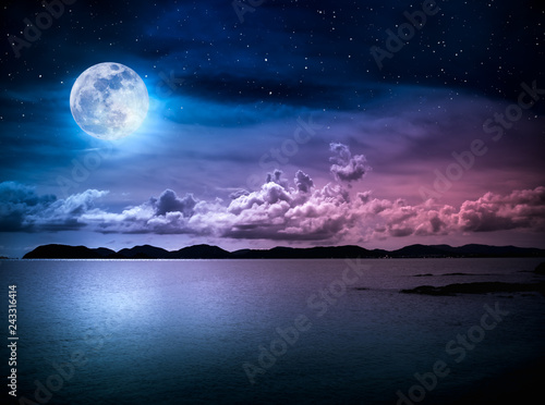 Landscape of sky with full moon on seascape to night. Serenity nature. photo