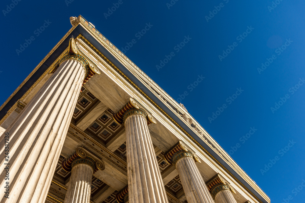 Fototapeta premium Classical marble pillars detail on the facade of a building