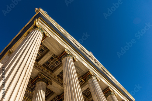 Classical marble pillars detail on the facade of a building