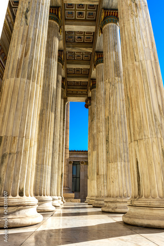Classical marble pillars detail on the facade of a building