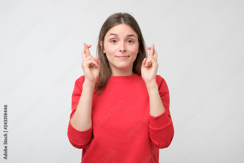 Girl eager to win competition, keeps fingers crossed as waits for results Girl eager to win competition, keeps fingers crossed as waits for results
