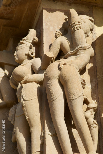 Erotic sculptures at Vishvanatha Temple at the  Western temples of Khajuraho in Madhya Pradesh, India. UNESCO World heritage site.