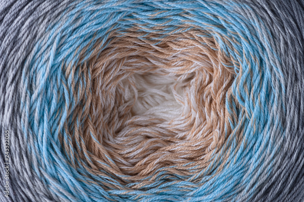 Fototapeta premium ball of colored threads close up macro, abstract circular background