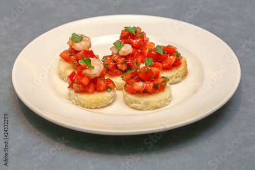Small Shrimp and Tomato Sandwiches at Plate