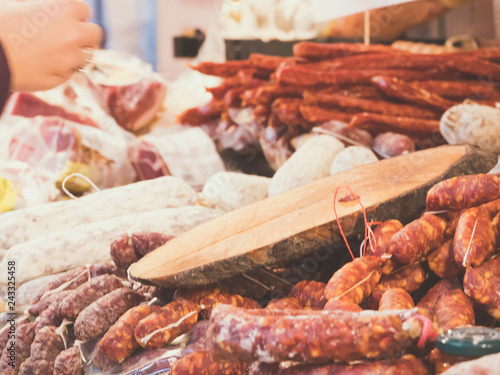 Close up of typical products of southern Itala Catania. These include salami with pepperoncino, fennel and aromatic herbs. All tasty Sicilian specialties.