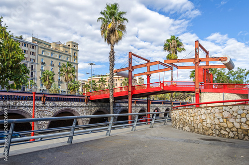 Passeig de Colom with a red bridge in Barcelona
