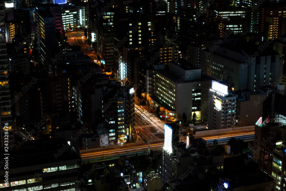 Tokyo city and skyline with night light and railway Tokyo city and skyline with night light and railway