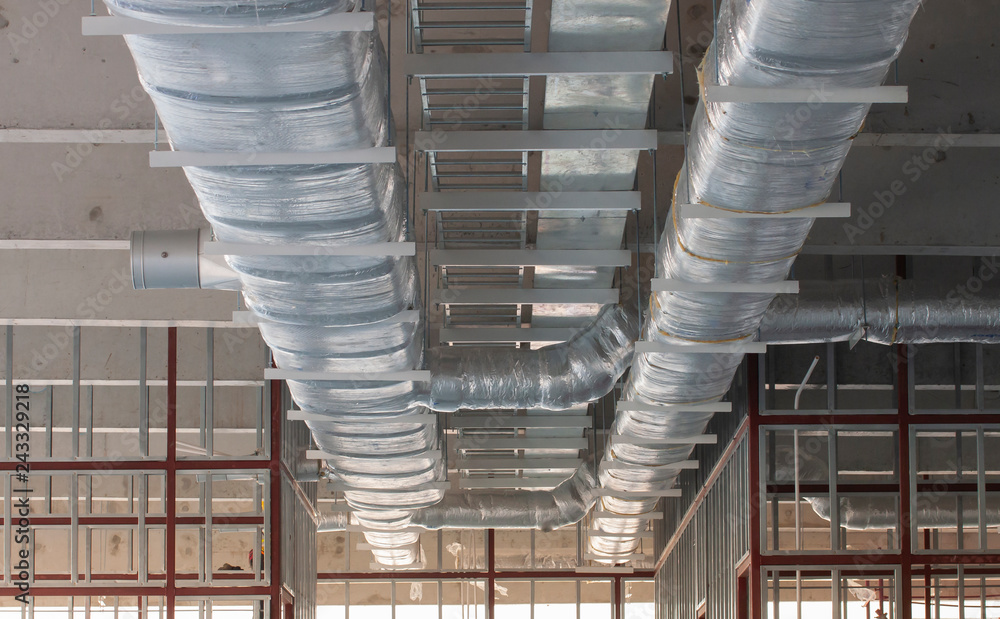 Typical installation of ducting with fiberglass insulation work combine