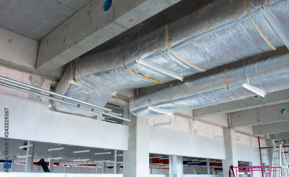 Typical installation of ducting with fiberglass insulation work combine with cable tray and fire fighting pipe - obrazy, fototapety, plakaty 