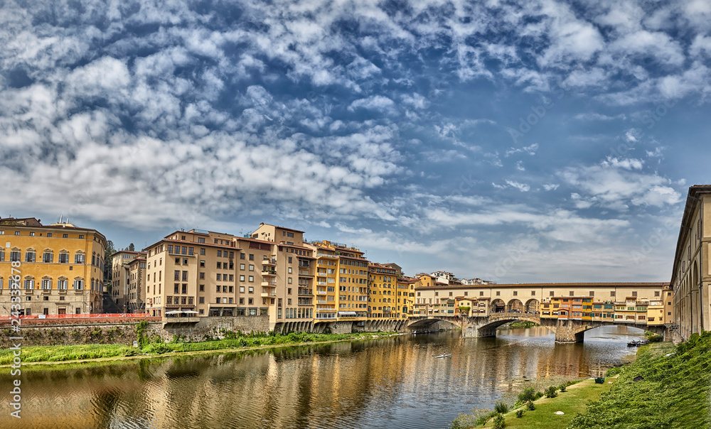 Florence or Firenze city view on Arno river, landscape with reflection. Tuscany, Italy.