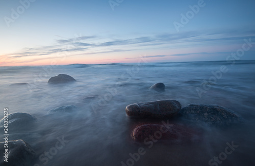 Beautiful sunset over the baltic sea photograped with long esposure