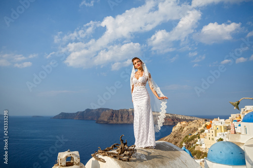 Bride in white dress on the roof