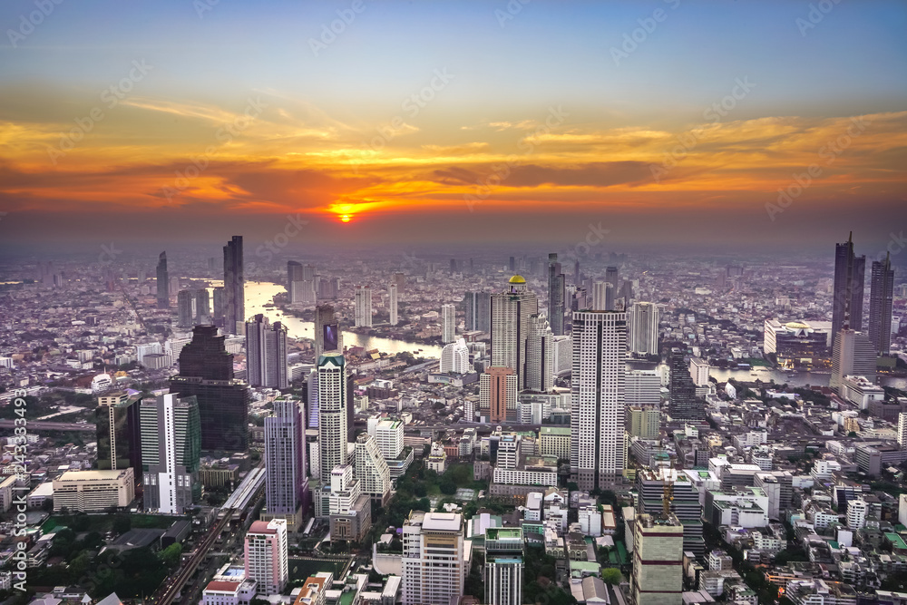 Bangkok city with sunset background.