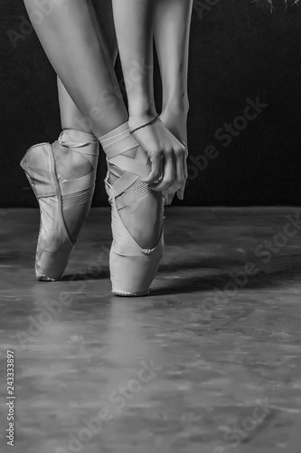 ballerina dancer shoes on the toes black and white