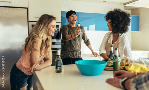 Photography Group of friends having a party at home