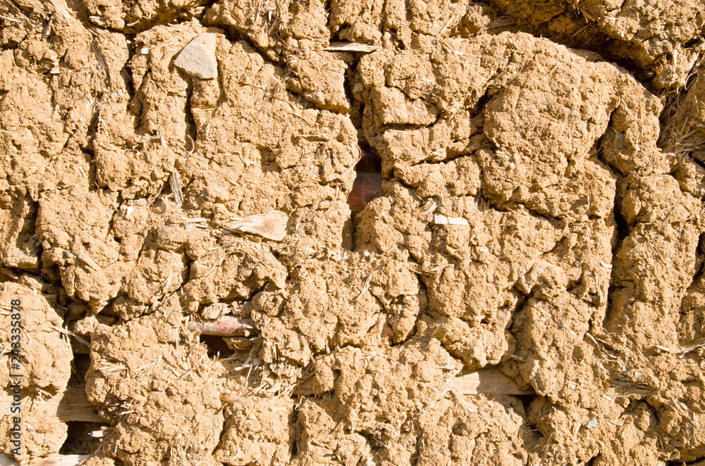 Old wall plastered with mud closeup Old wall plastered with mud closeup