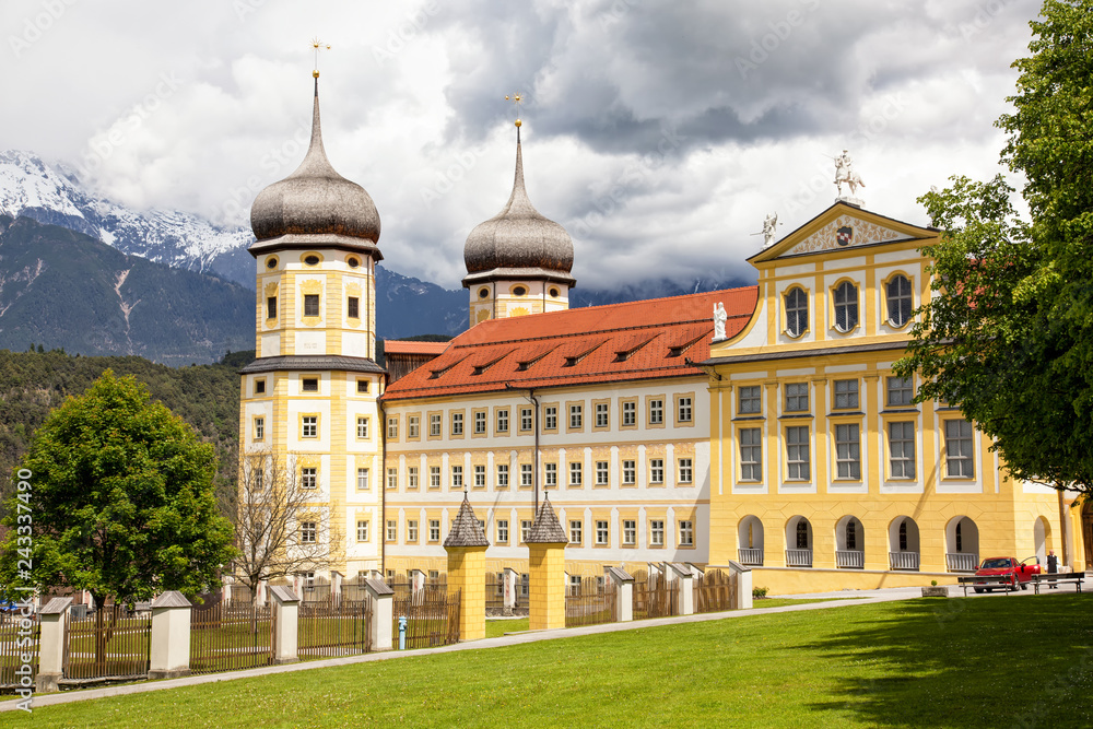 Exterior of the stams Abbey (Stift Stams) established by Cistercian monks in 1273 in Tyrol, Austria and later revamped in Baroque style. Exterior of the stams Abbey (Stift Stams) established by Cistercian monks in 1273 in Tyrol, Austria and later revamped in Baroque style.