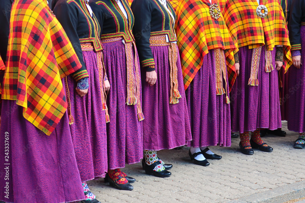 Several women in latvian traditional folk costume singing - obrazy, fototapety, plakaty 