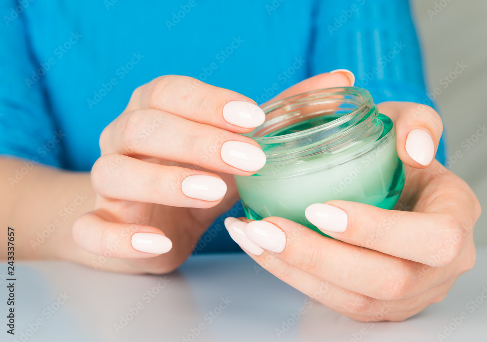 beautiful woman hands with cream beautiful woman hands with cream