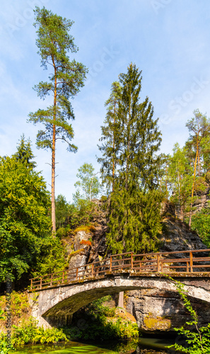 Bridge over river Kamenice in Bohemian Switzerland National Park, Czech Republic.