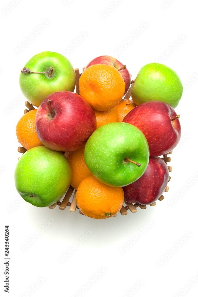 Apple, mandarin and orange in a basket Apple, mandarin and orange in a basket