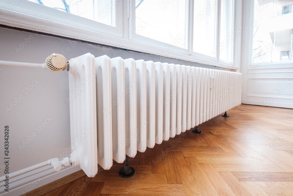 radiator and thermostat in flat -  heater closeup - obrazy, fototapety, plakaty 