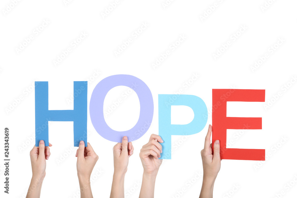 Hands holding the word Hope on white background Hands holding the word Hope on white background